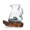Molten glass on wood water jug