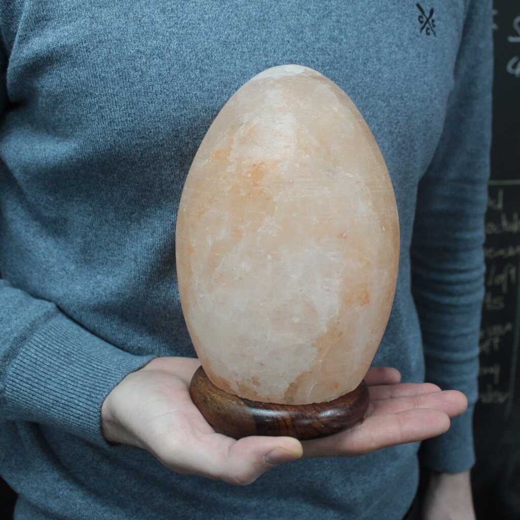 Himalayan Rock Crystal Egg in palm of hand