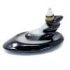 a backflow incense burner in the shape of small pebbles.