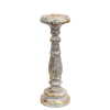 a medium candle stand in white and gold