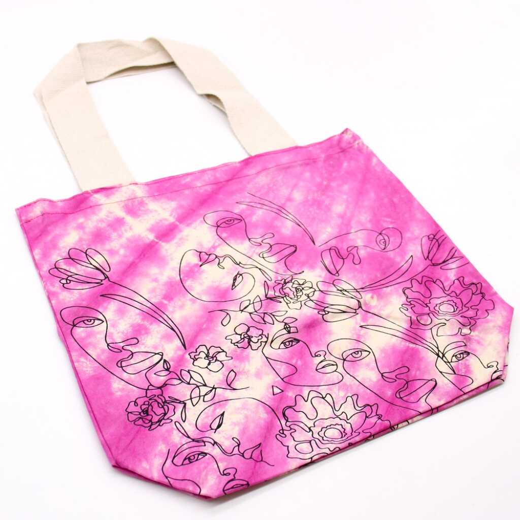 Tie-dye cotton bag with magenta pretty face design