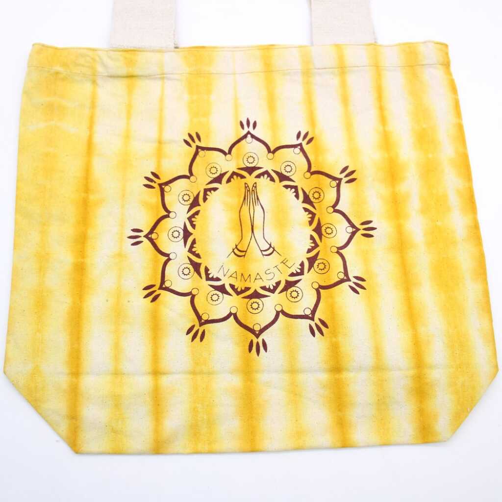 Tie-dye cotton bag with Namaste Hands design in yellow