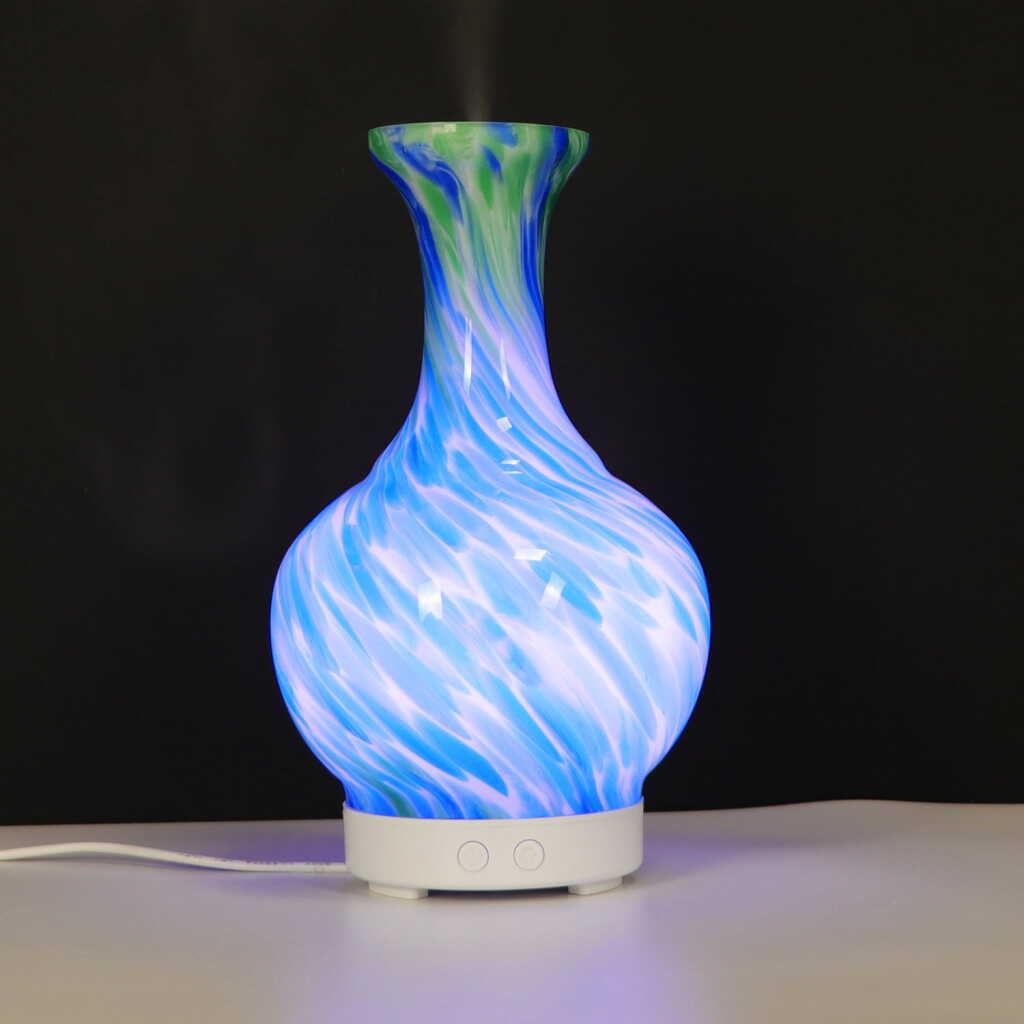 lit blue and green aromatherapy atomiser