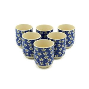 six herbal tea cups in a blue daisy pattern