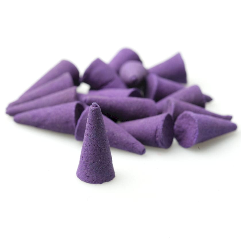 a heap of purple incense cones