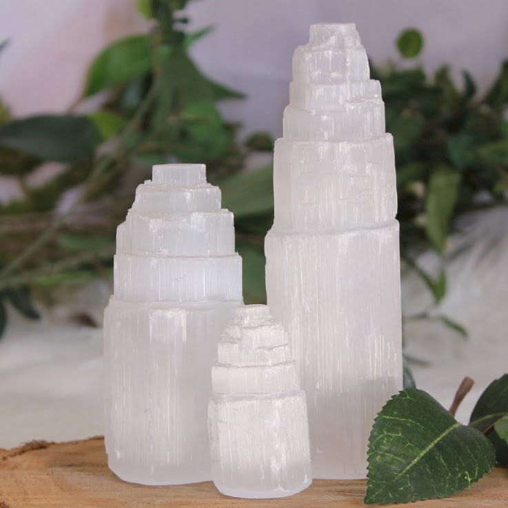 three selenite lamp towers