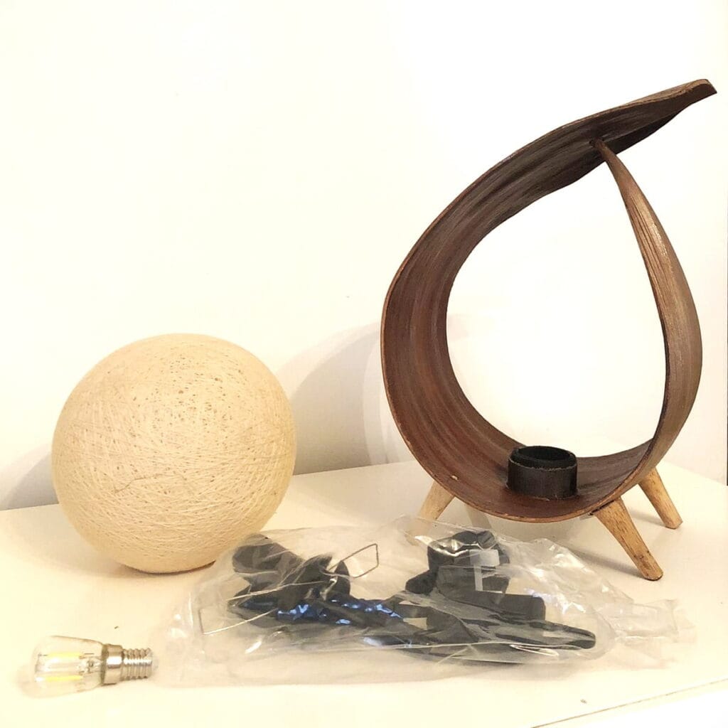 a coconut leaf lamp before assembly