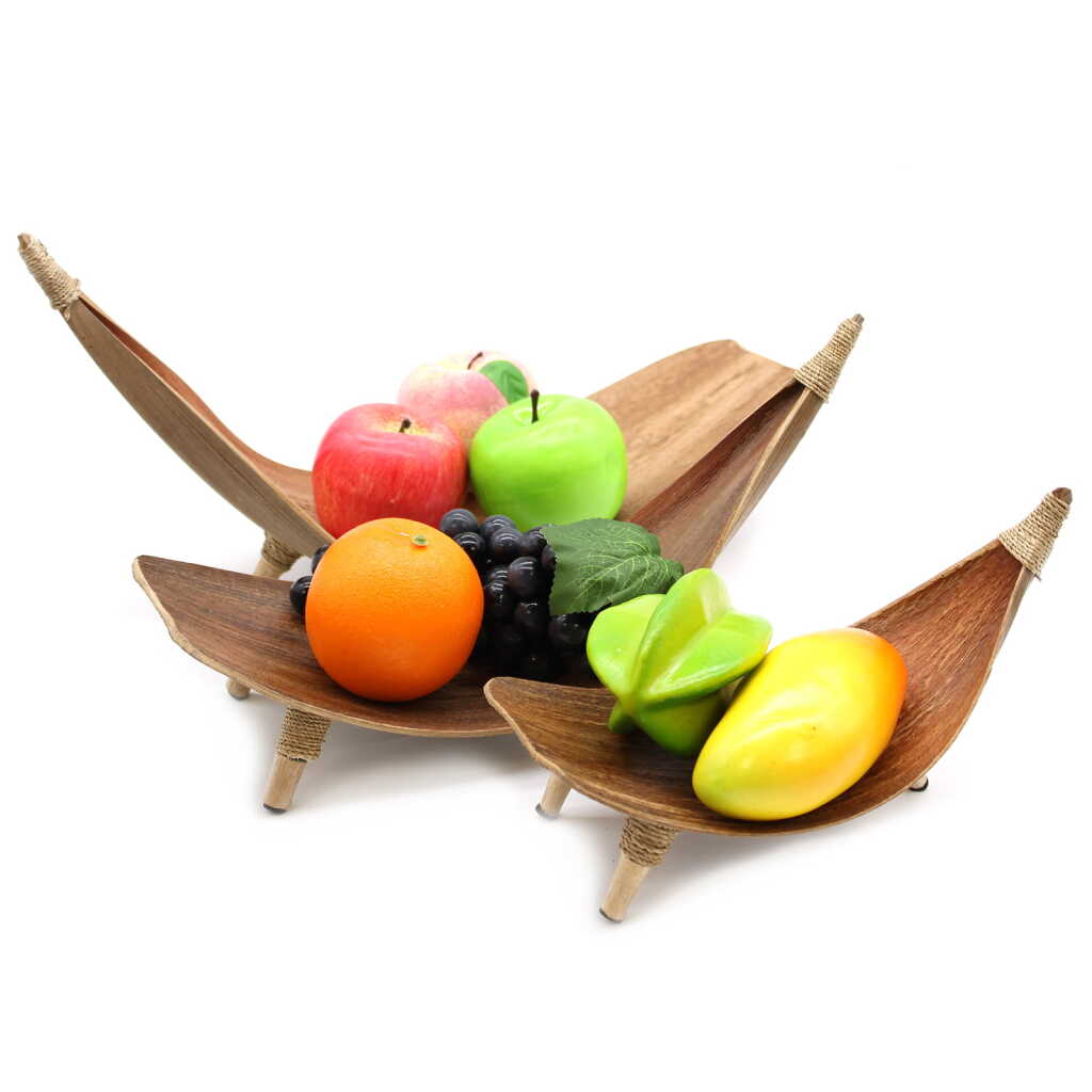 set of three coconut leaf fruit bowls, with fruit