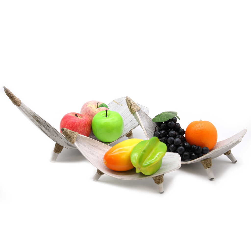 set of three coconut leaf fruit bowls, with fruit