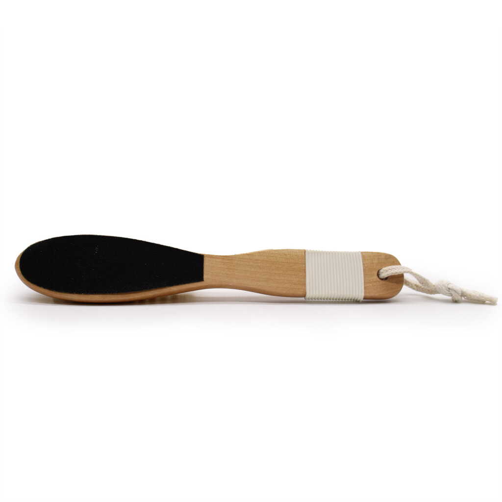 a combination exfoliating brush and file