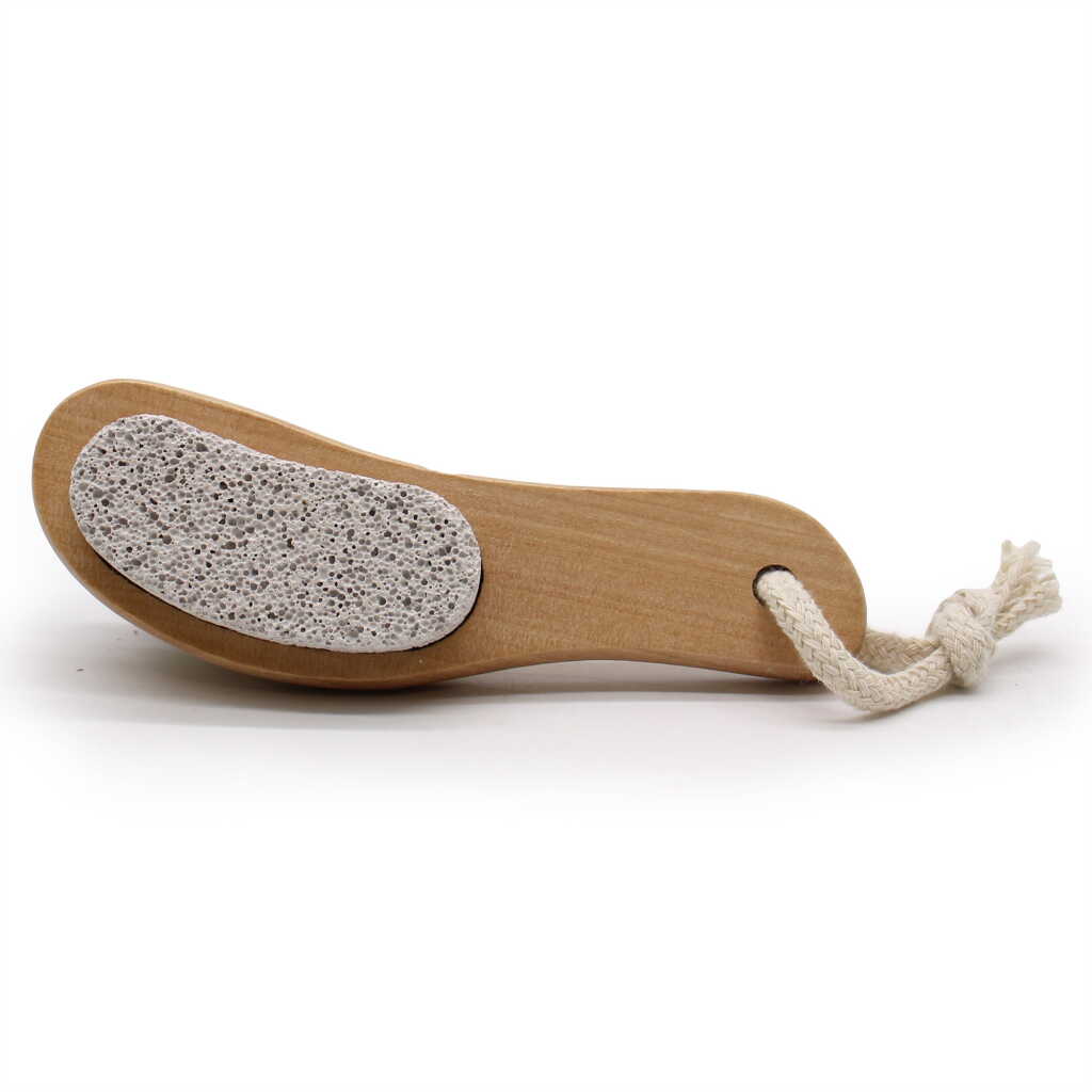 a face and body brush with pumice on the back - looking at the pumice