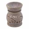 a soapstone oil burner with an elephant design.