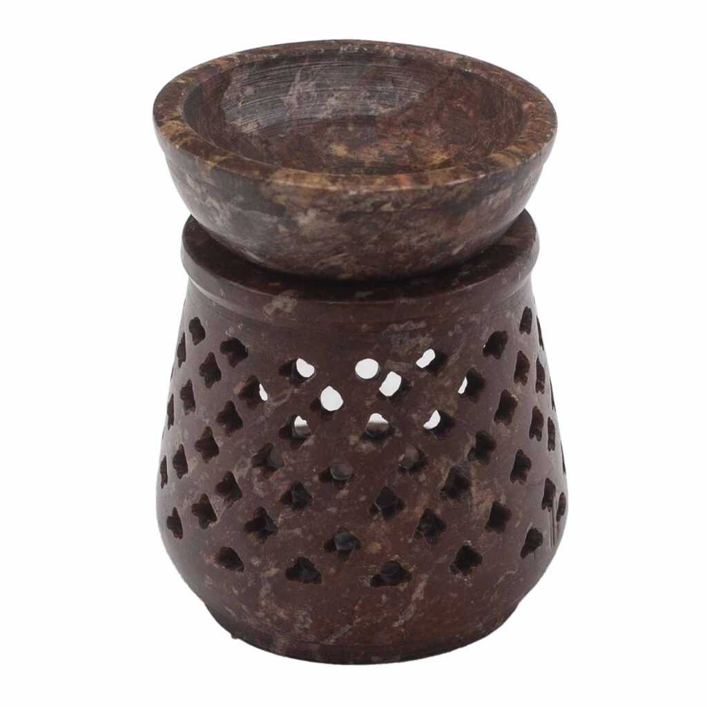 a soapstone oil burner with a classic design.