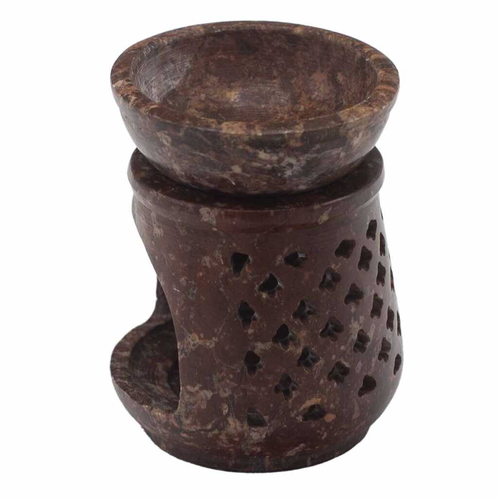 a soapstone oil burner with a classic design.