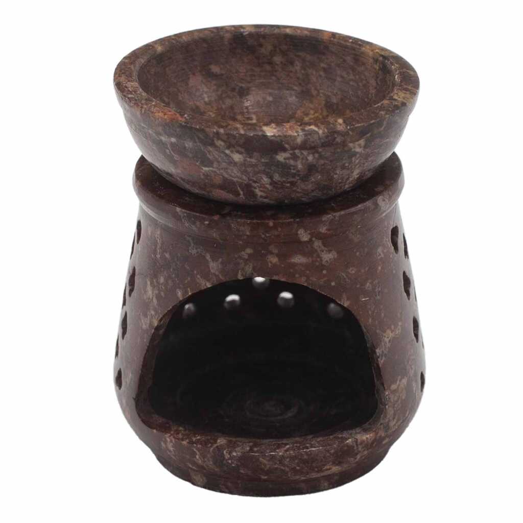 a soapstone oil burner with a classic design.