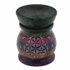 a five coloured soapstone oil burner with a flower of life design.