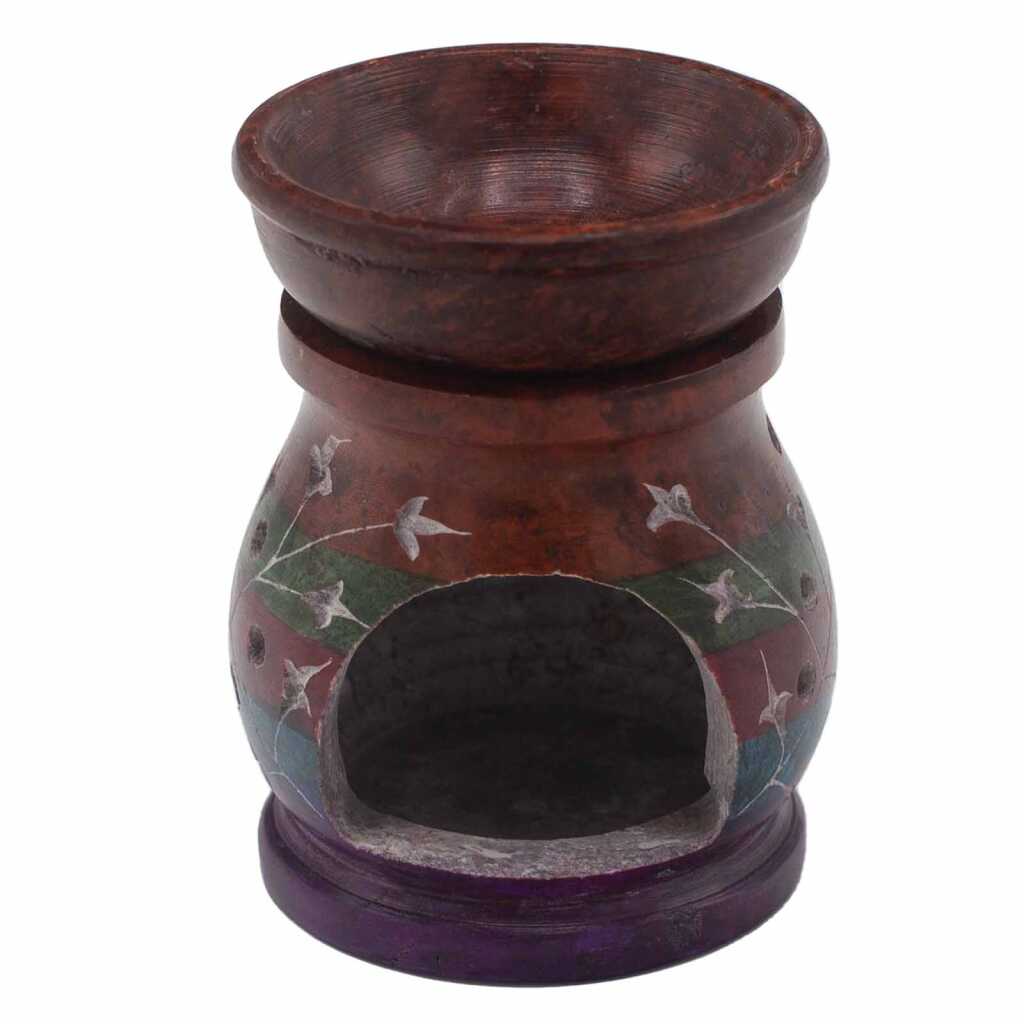 a five coloured soapstone oil burner with a hamsa design.