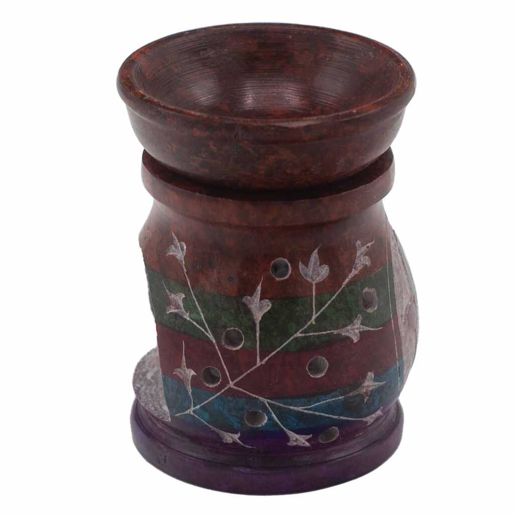a five coloured soapstone oil burner with a hamsa design.