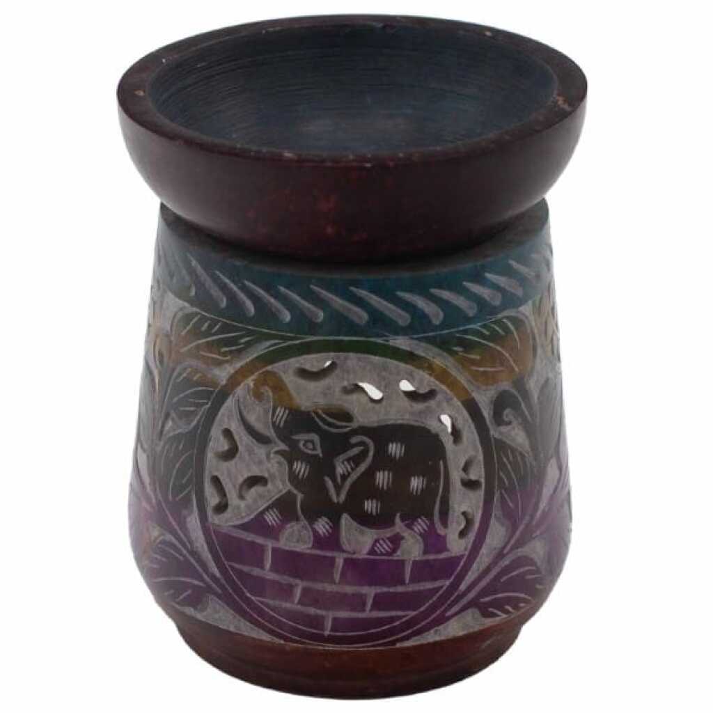 a five coloured soapstone oil burner with an elephant design.