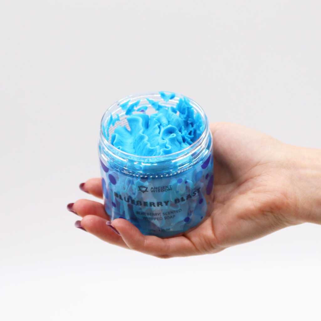 campfire clouds - vanilla marshmallow whipped soap - blue - in an open container, in an open hand