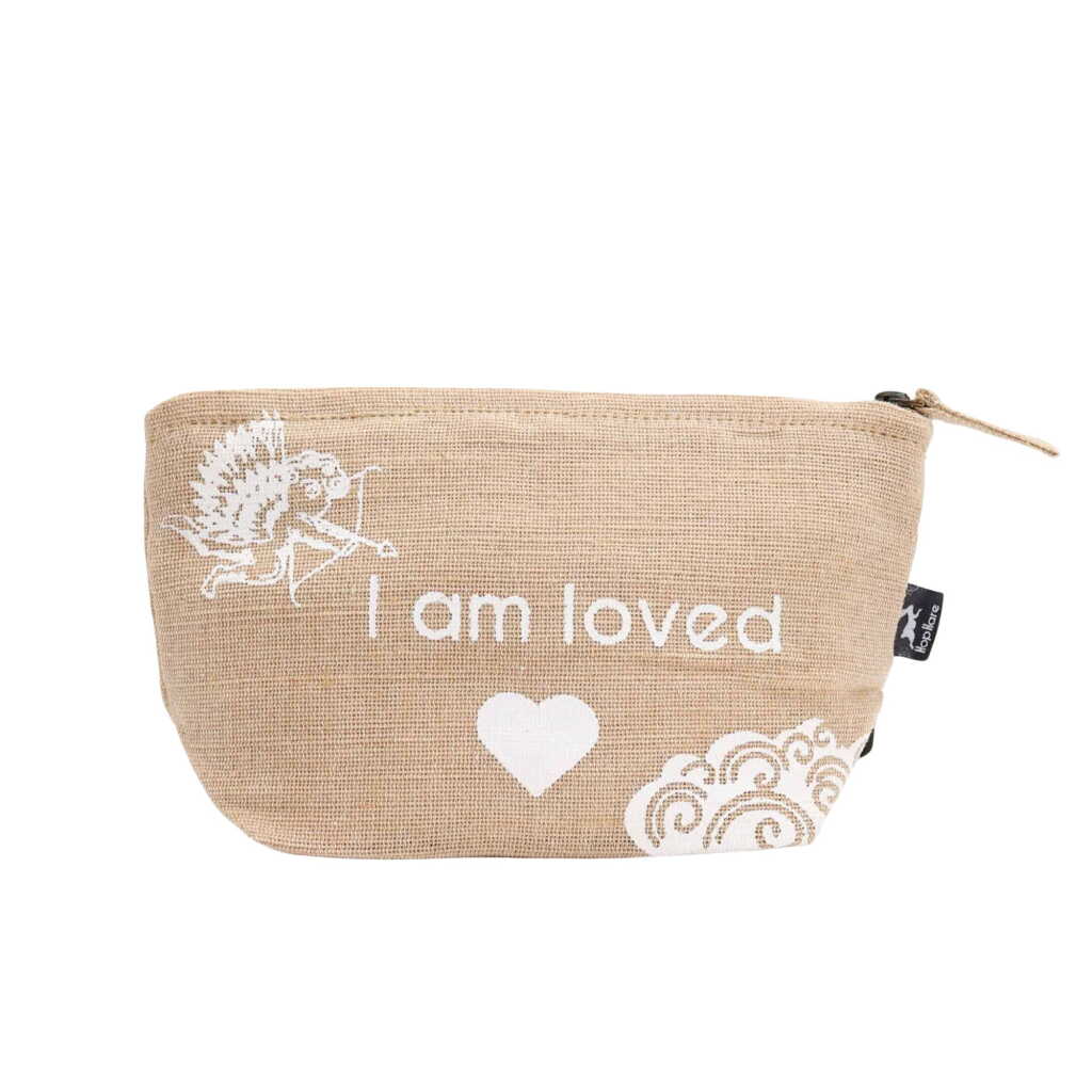 A jute pouch with the words "I am loved" written on the side.