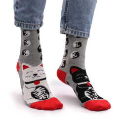 a pair of lucky cat hop hare bamboo socks being worn.