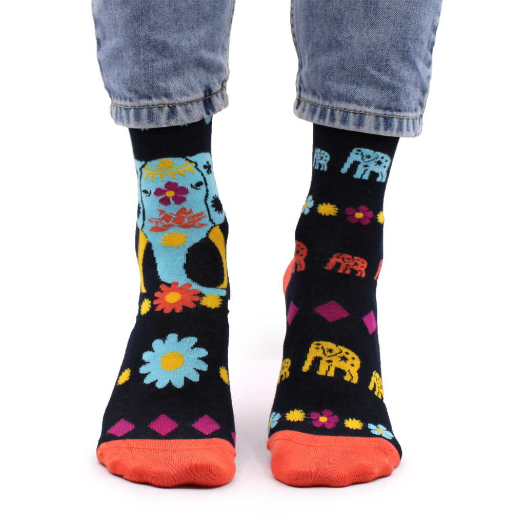 a pair of cosmic elephant hop hare bamboo socks being worn.