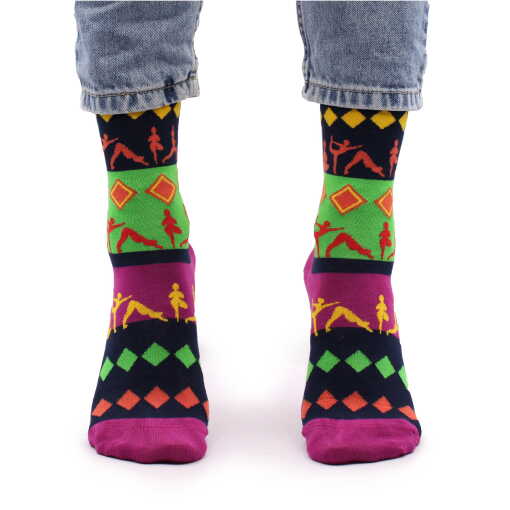 a pair of yoga poses hop hare bamboo socks being worn.