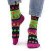 a pair of yoga poses hop hare bamboo socks being worn.