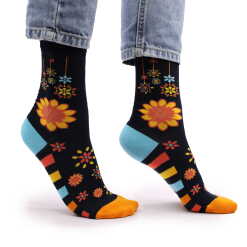 a pair of mandala flowers hop hare bamboo socks being worn.