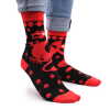 a pair of red dragons hop hare bamboo socks being worn.