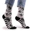 a pair of ying yang hop hare bamboo socks being worn.