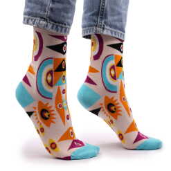 a pair of evil eye hop hare bamboo socks being worn.