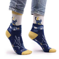 a pair of midnight cat hop hare bamboo socks being worn.