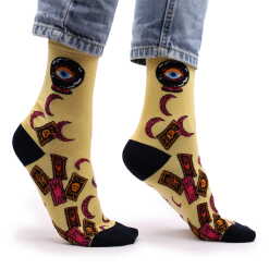 a pair of tarot cards hop hare bamboo socks being worn.