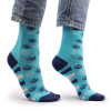 a pair of pentagram and evil eye hop hare bamboo socks being worn.