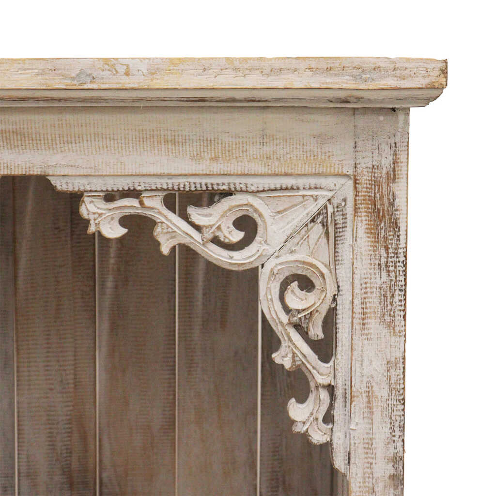a whitewash albasia wood ornate bathroom cabinet corner detail