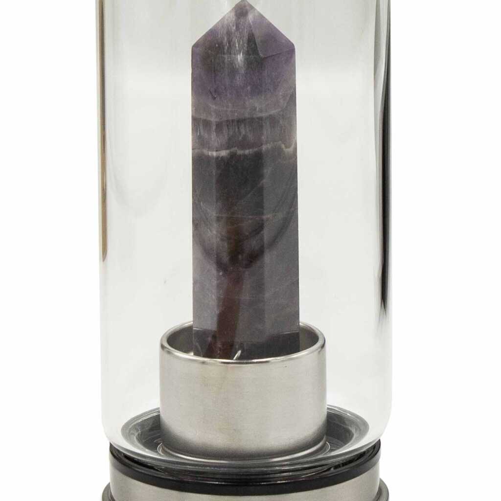 A amethyst obelisk, crystal infused water bottle