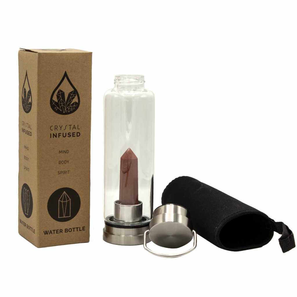 A red jasper obelisk, crystal infused water bottle