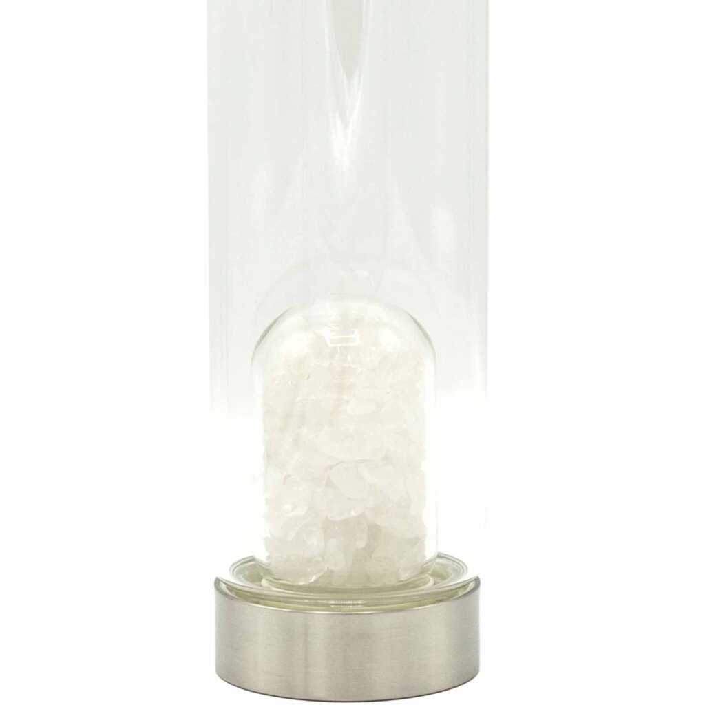 A clear quartz crystal infused water bottle
