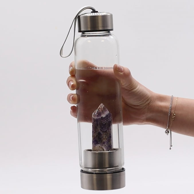 a water bottle with an internal crystal