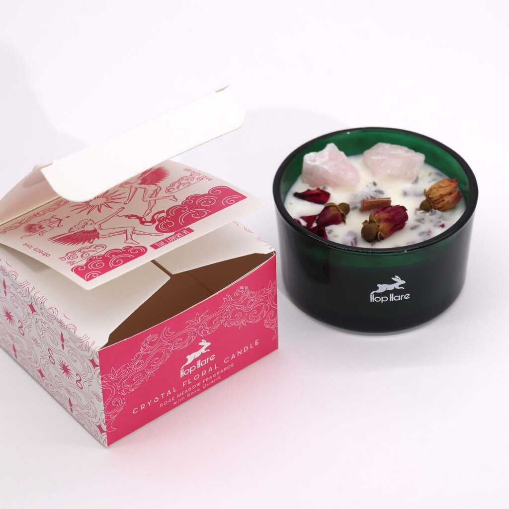 Hop Hare candle with crystals, rose flowers and pink packaging