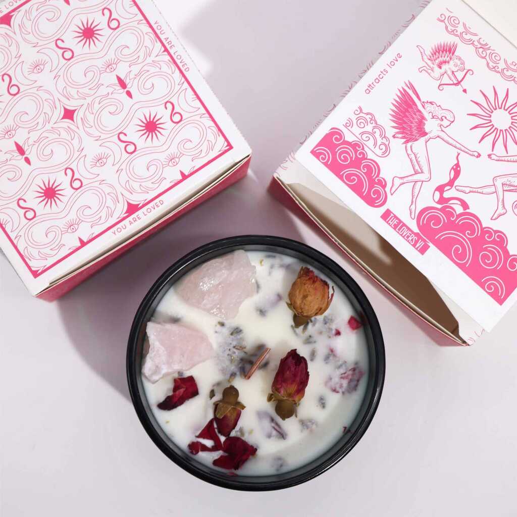 Hop Hare candle with crystals, rose flowers and pink packaging