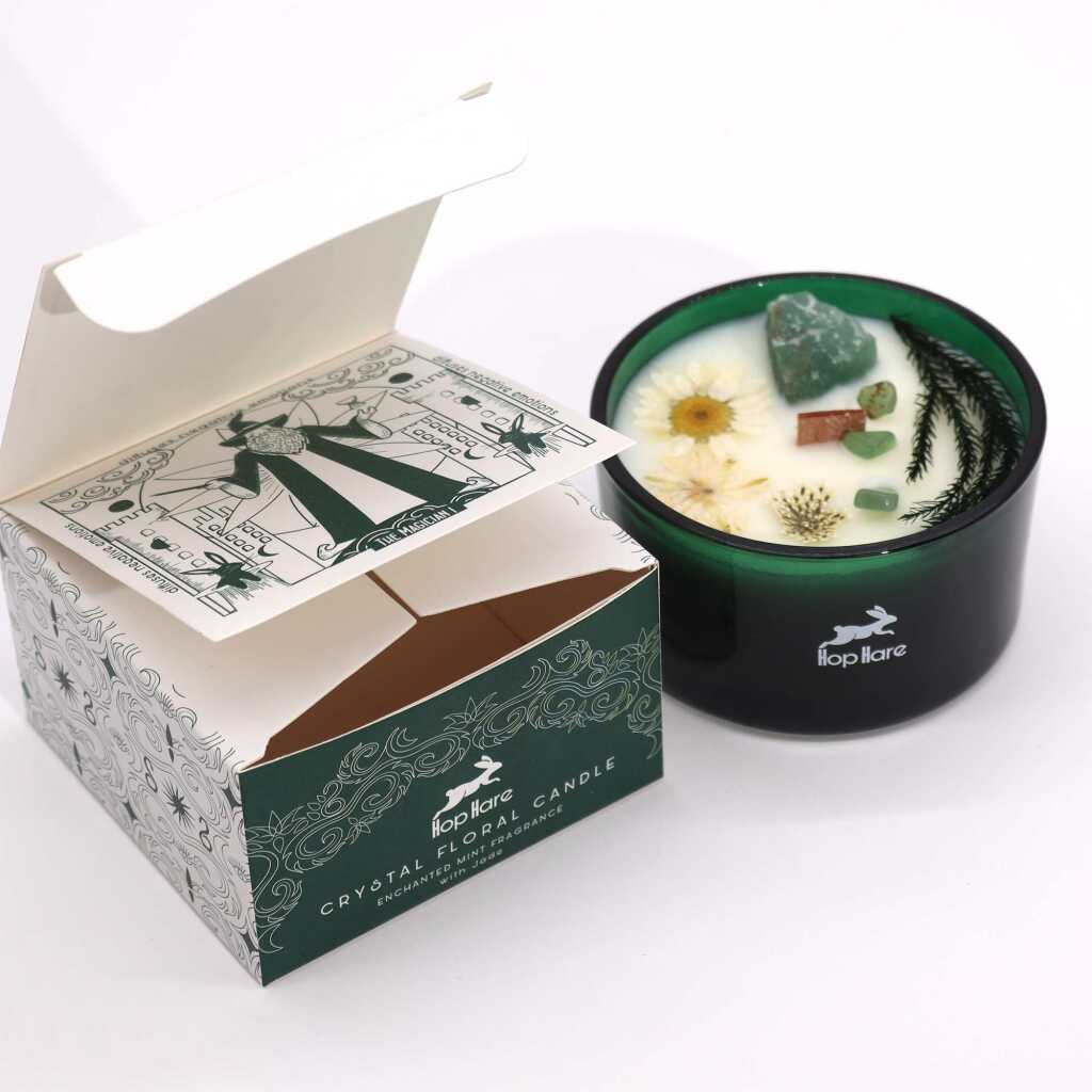 Hop Hare candle with crystals, rose flowers and green packaging