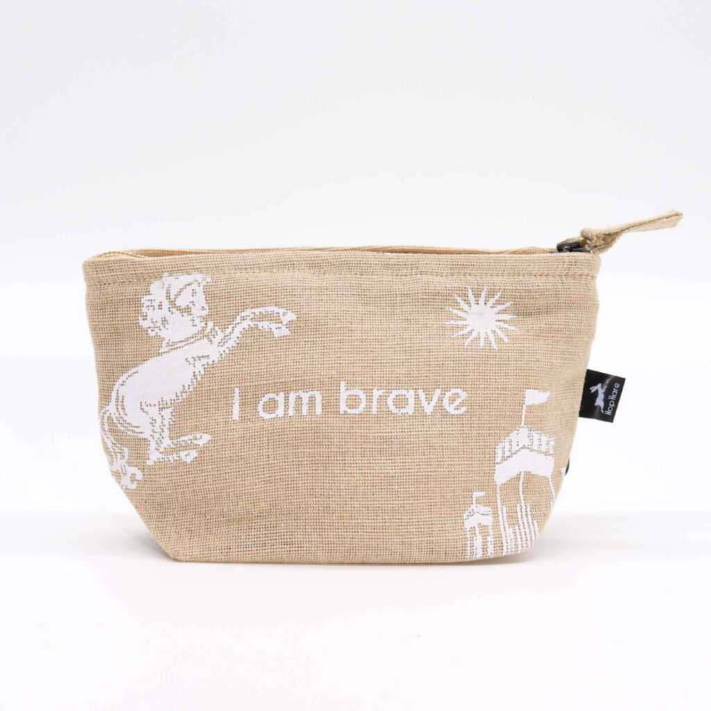 A jute pouch with the words "I am brave" written on the side.