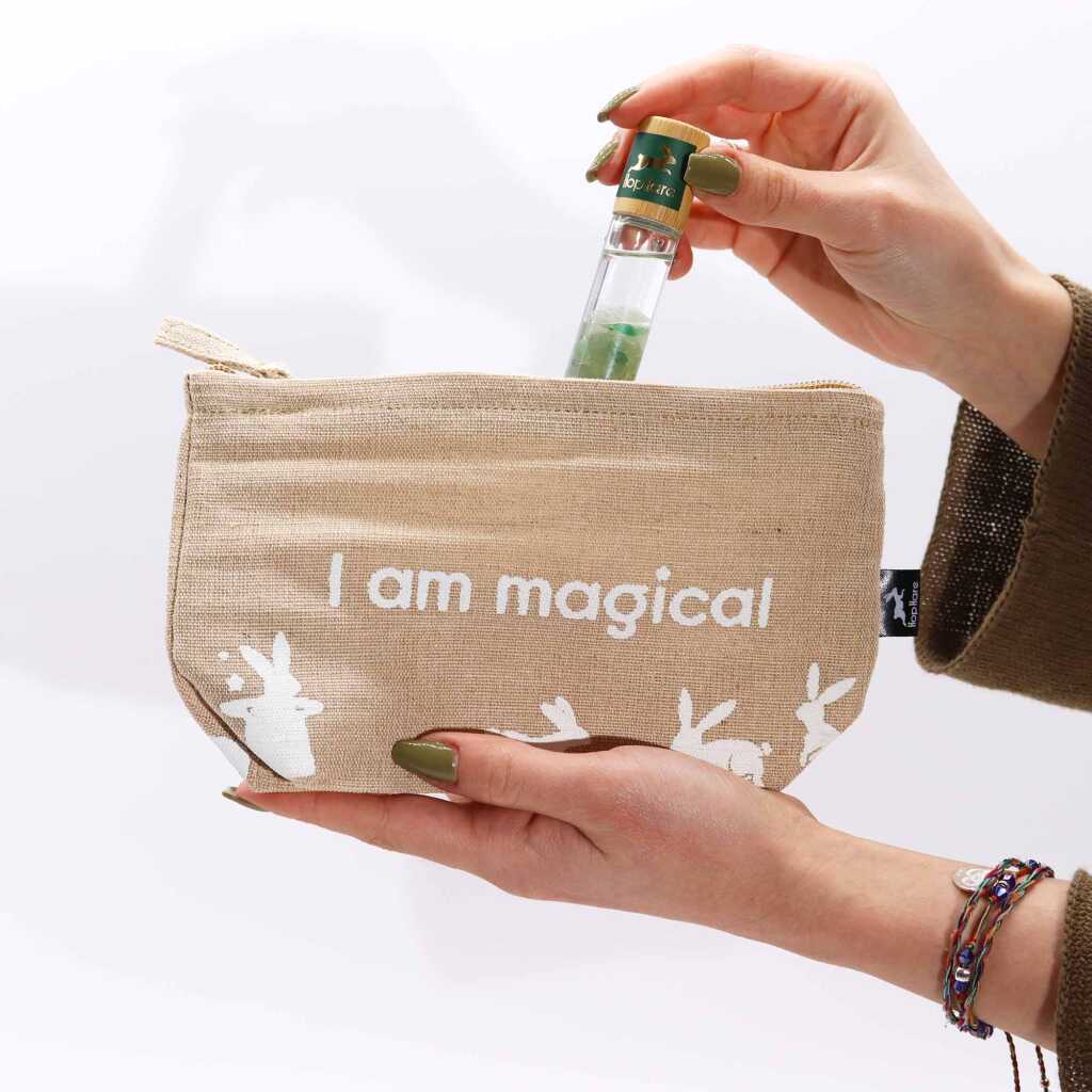 A jute pouch with the words "I am magical" written on the side.