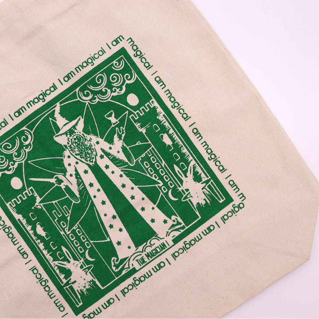 hop hare tote bag with a green I am Magical logo