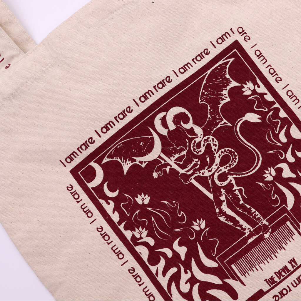 hop hare tote bag with a dark red I am Rare motif