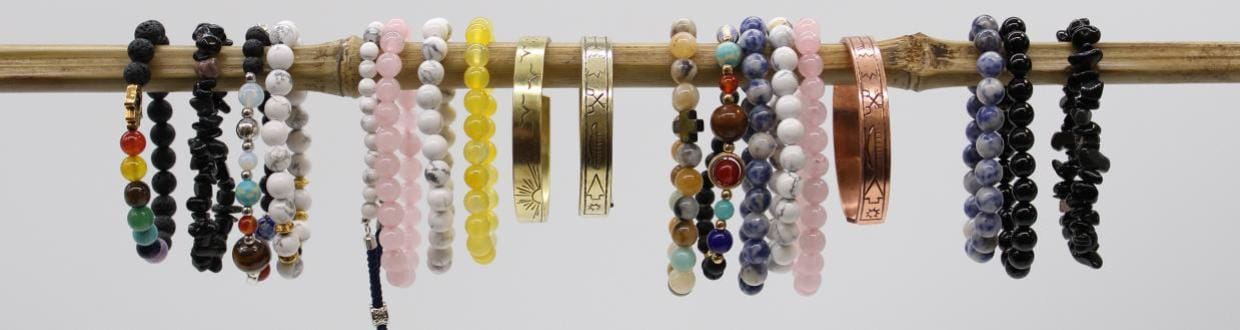 bracelets strung along on a pole