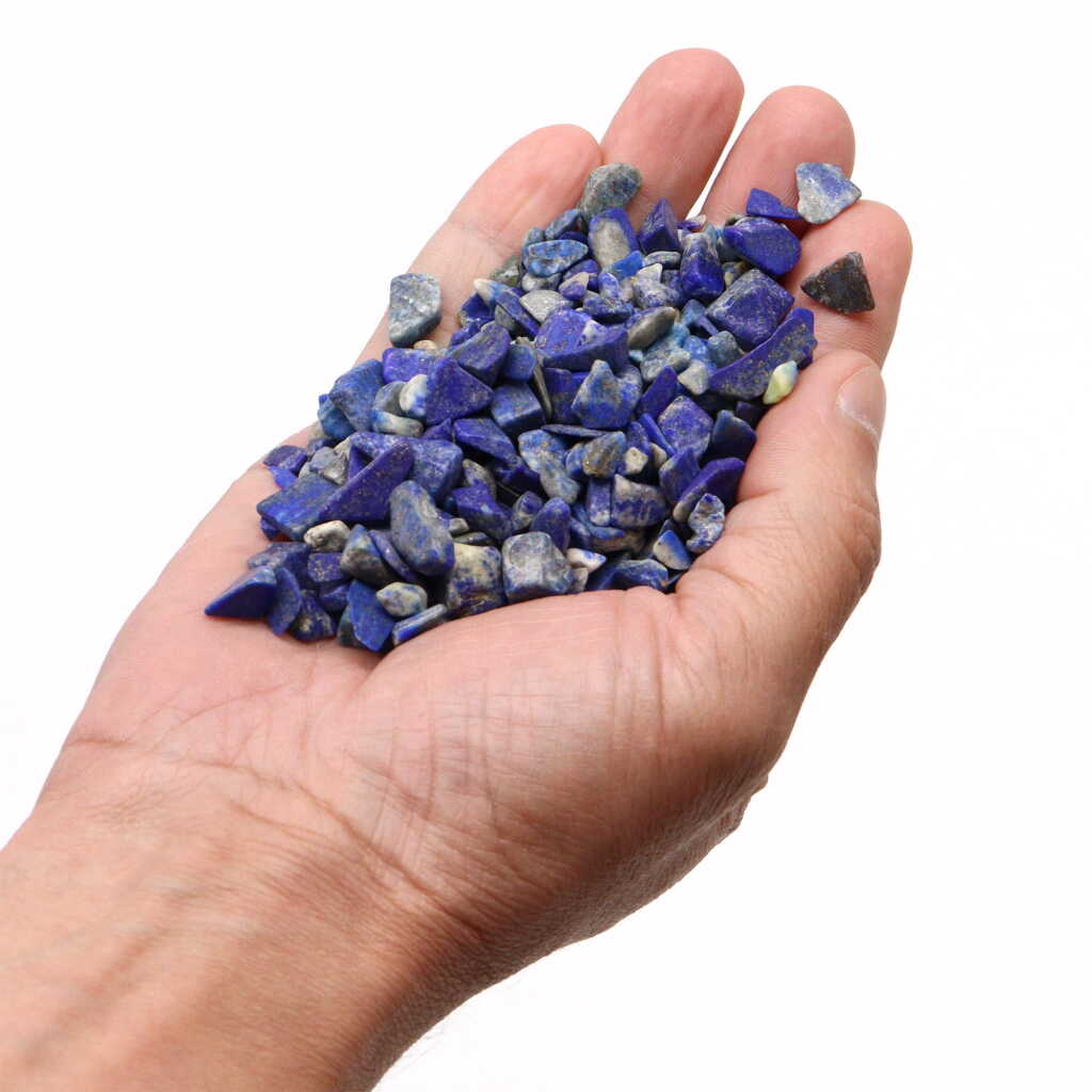 lapis lazuli chips held in an open hand